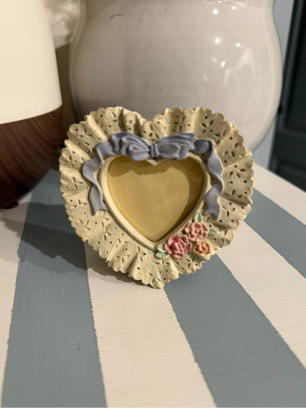 Heart-Shaped Ceramic Photo Frame in Cream with Blue Bow and Pink Flowers